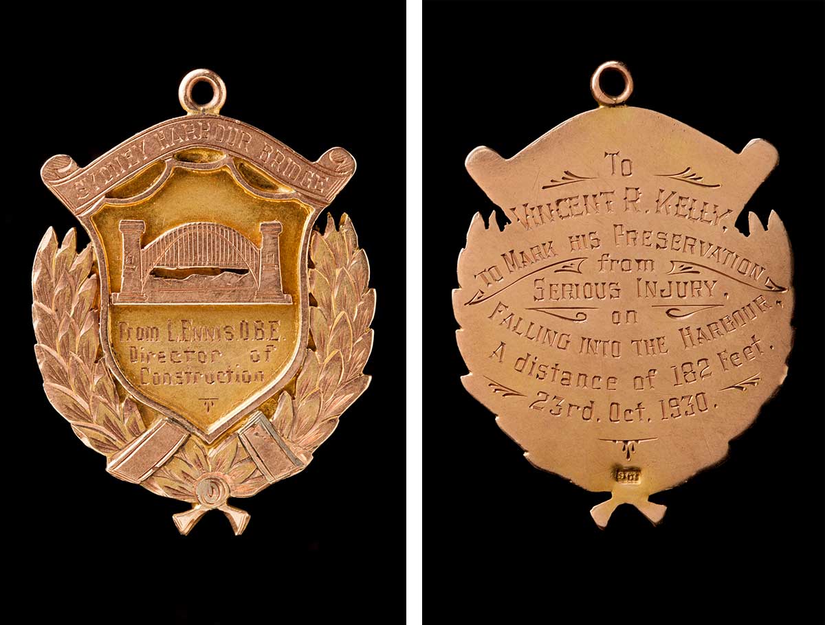 The front and back of a medal awarded to Vincent Kelly.  The front has an image of the Sydney Harbour Bridge with an inscription that reads: 'From L. Ennis. O.B.E. Director of Construction'. The inscription on the back reads: 'To Vincent R. Kelly. To mark his preservation from serious injury on falling into the harbour. A distance of 182 feet. 23rd. Oct. 1930.' - click to view larger image