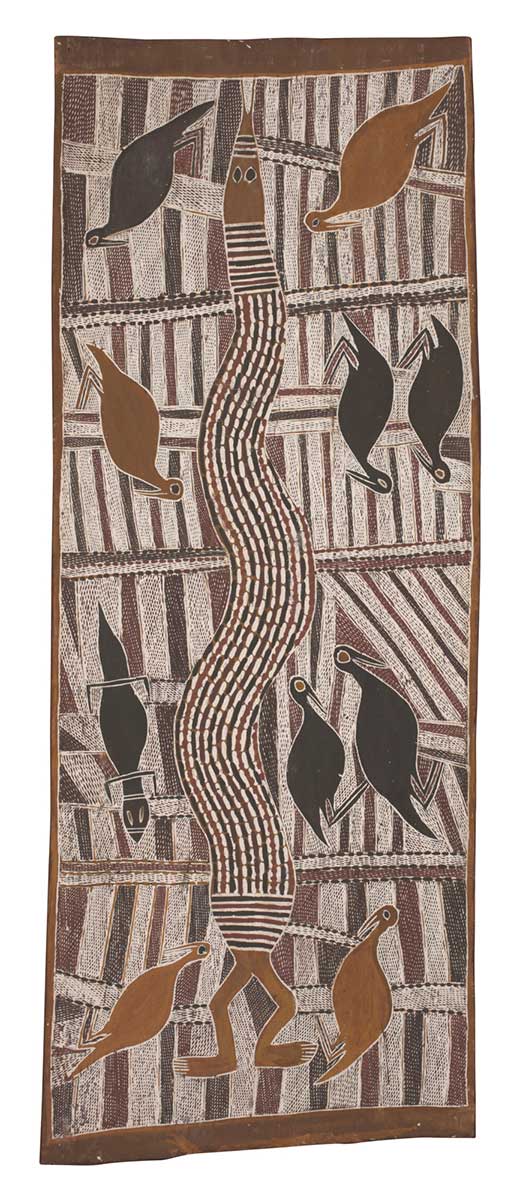 A bark painting worked with ochres on bark. The painting is divided into four panels with a python in the centre which has human legs and feet. The top panel depicts two birds, the next panel depicts three, the third panel depicts two birds and a lizard and the lowest panel, two birds. The painting has a background of vertical stripes of crosshatching with horizontal bands crossing these at intervals. - click to view larger image