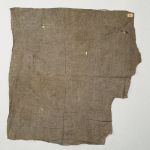 Thin two-layered barkcloth with a grey colour. It has perforations derived from the beating process.