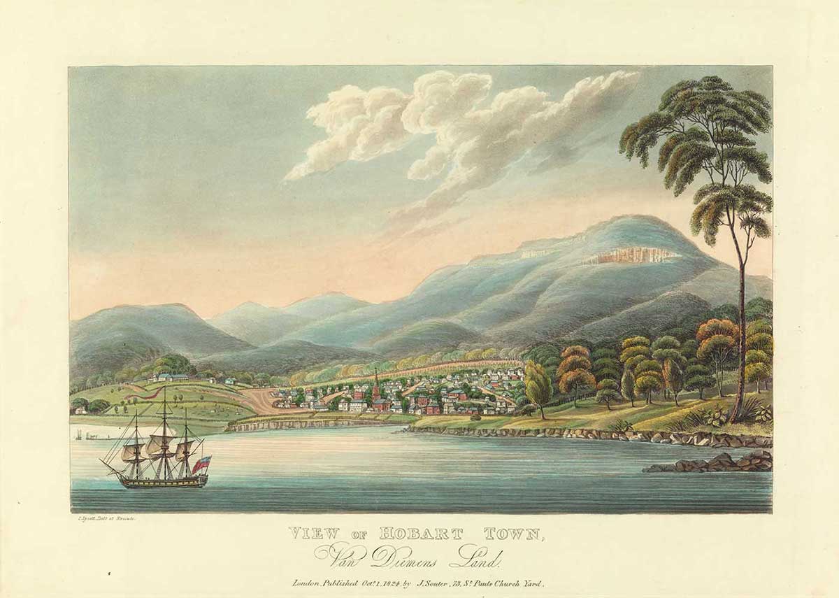 Colour picture showing a small town on the edge of a harbour. A ship is in the foreground; hills are in the background.