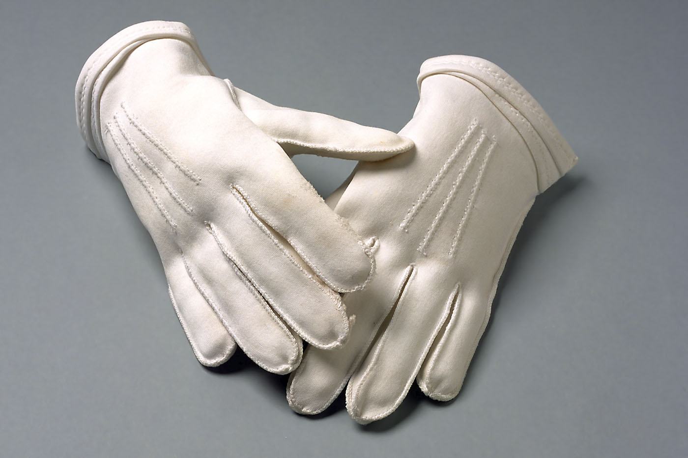 A pair of white gloves.