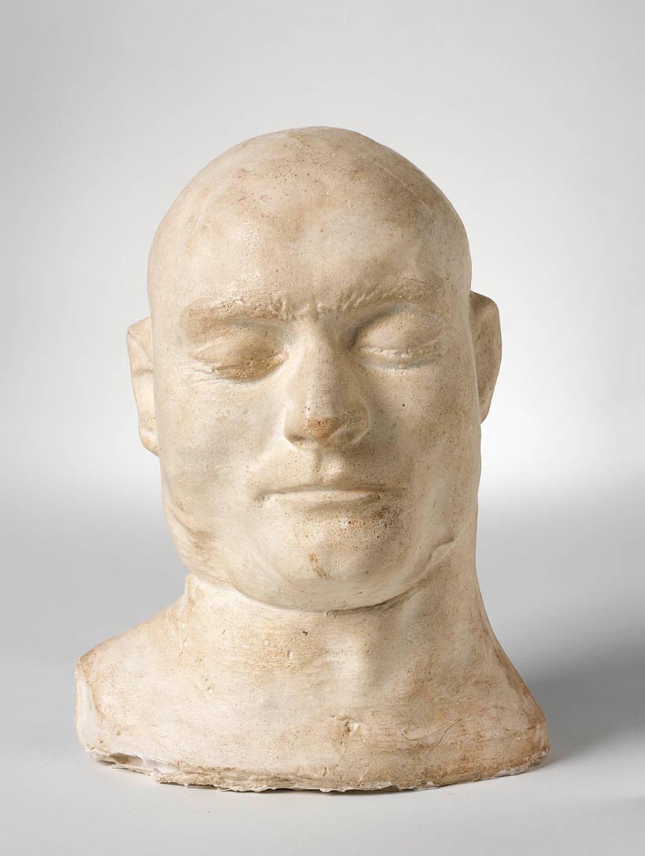 Plaster death mask of the head of bushranger Ned Kelly, including the neck and partial right shoulder. - click to view larger image