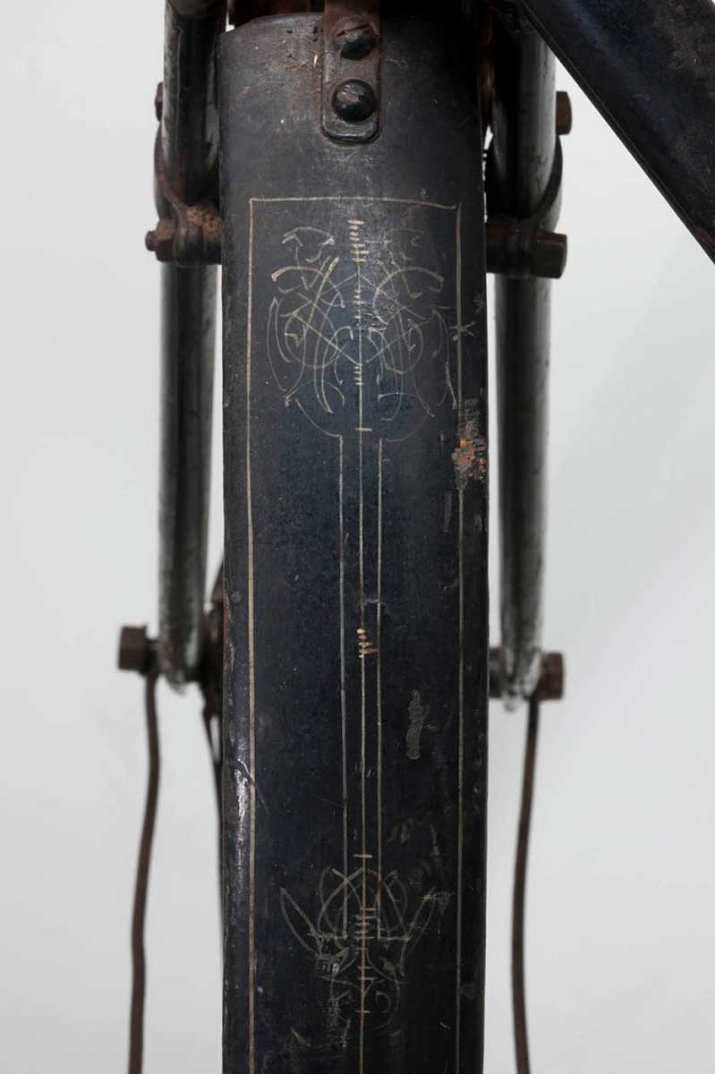 Detail of a bike featuring a design on the front of a mudguard. - click to view larger image