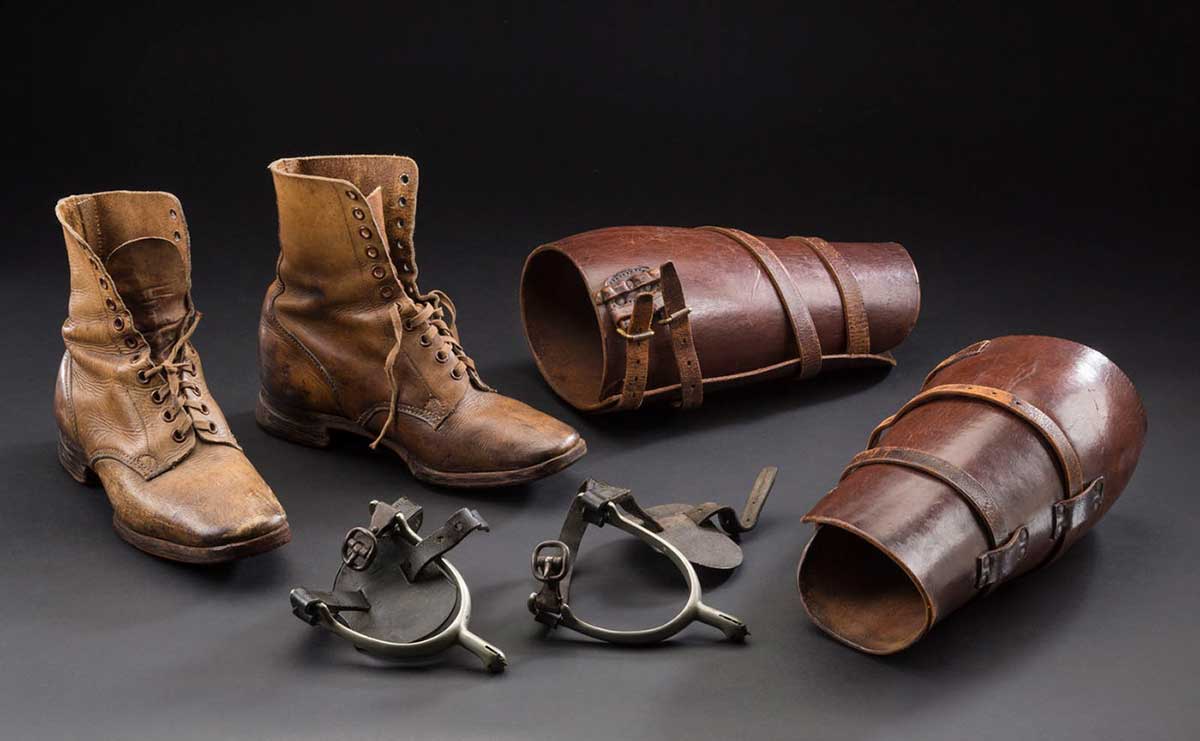 Taylor's boots, spurs and gaiters; the leather leggings are marked '199 – Taylor, J.S.'. - click to view larger image