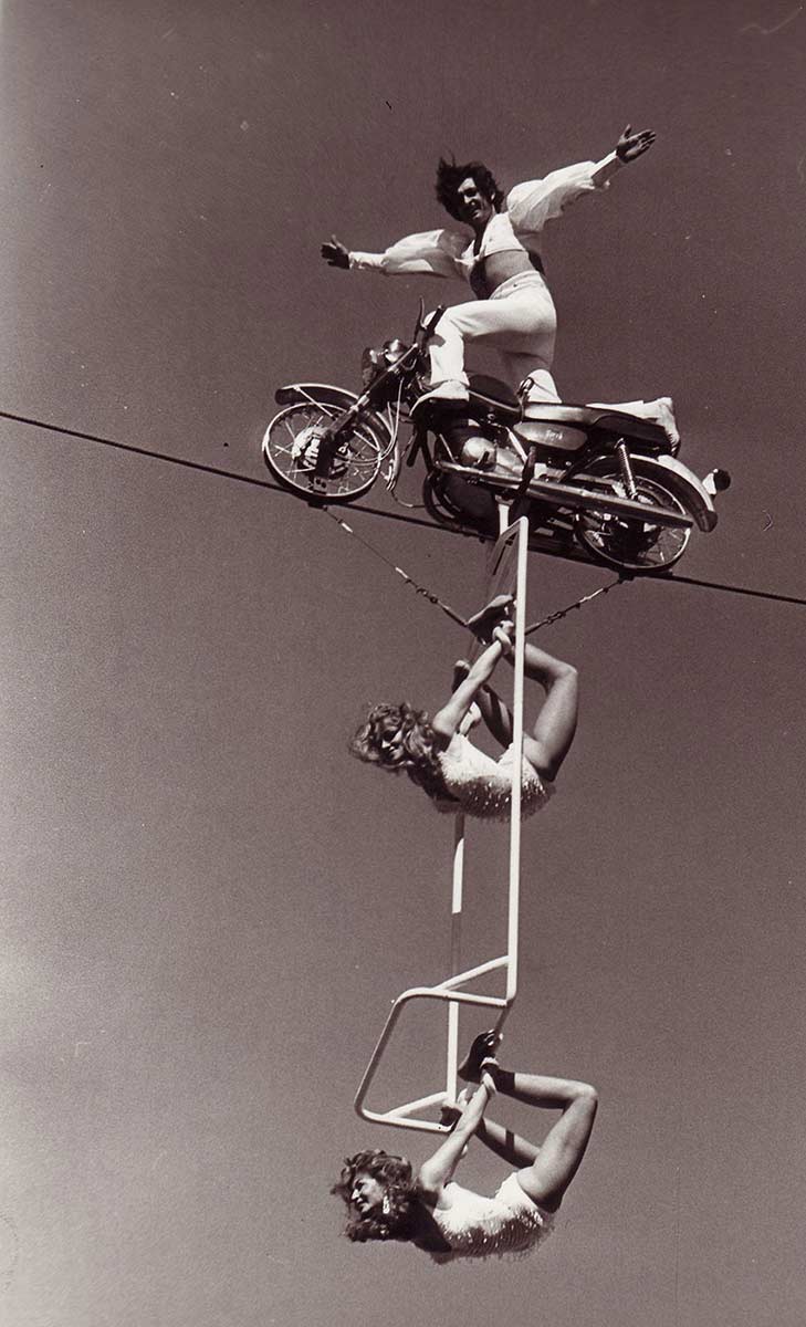 Acrobats on a high wire.  - click to view larger image