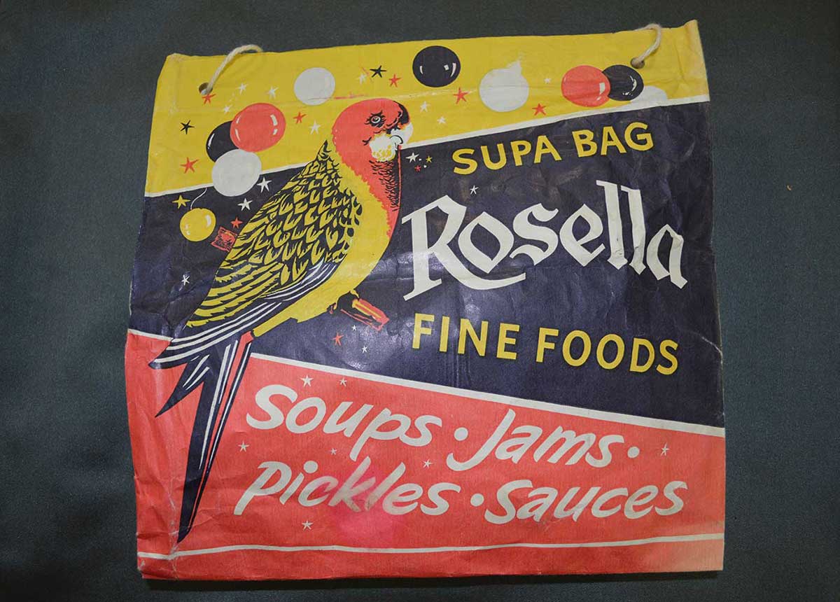 Colour photograph of a show bag with printed text 'Supa Bag, Rosella Fine Foods, Soups, Jams, Pickles, Sauces'. - click to view larger image