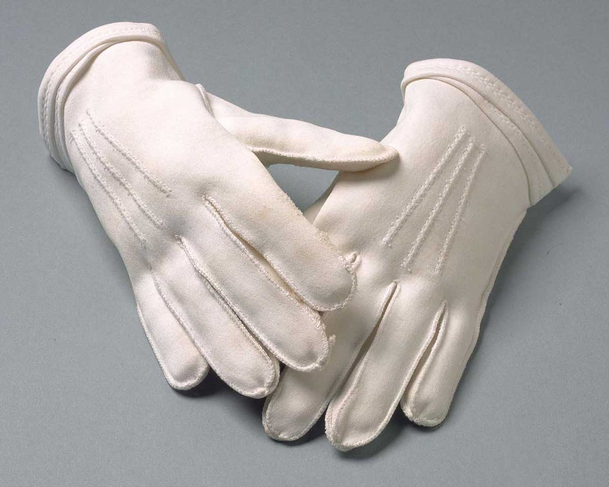 A pair of ladies' short white gloves. - click to view larger image