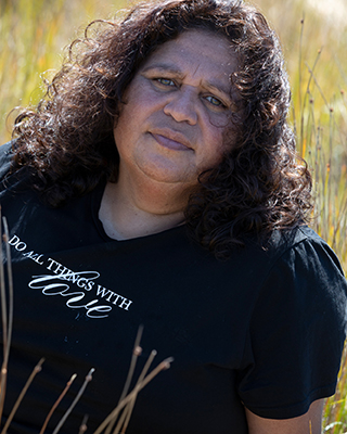 A portrait photo of Cheryl Davison, Aboriginal Creative Producer at Four Winds Festivals.