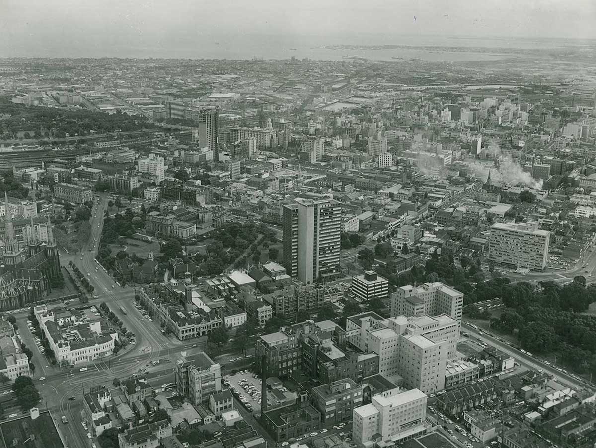 Black and white photo of an aerial view of a city.