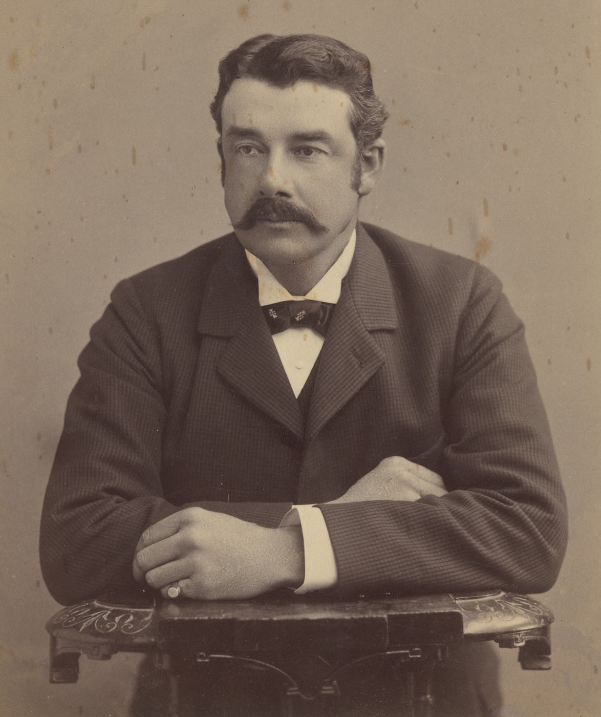 Black and white studio photograph of Lucian Faithfull. - click to view larger image