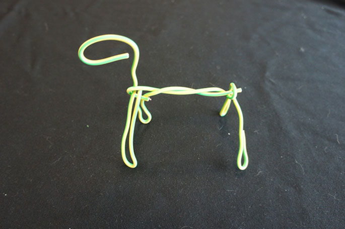 Electrical wire bent into the shape of a horse.