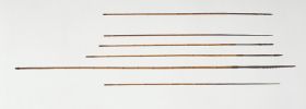 Arrows made of reed or bamboo with the point made from hard black wood.