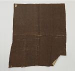 Thick barkcloth that consists of two different pieces pasted together. One piece is brown and the other white.