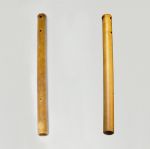 Two nose flutes made from a piece of bamboo cane.