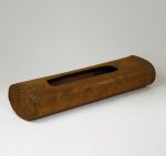 Medium-brown wood box made from a hollowed-out tree trunk with a rectangular opening.