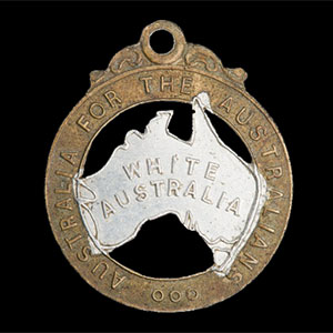 this 28mm-high badge has the words ‘Australia for the Australians’ stamped on the rim and the words ‘White Australia’ stamped on silver-painted representation of the Australian continent in the middle.