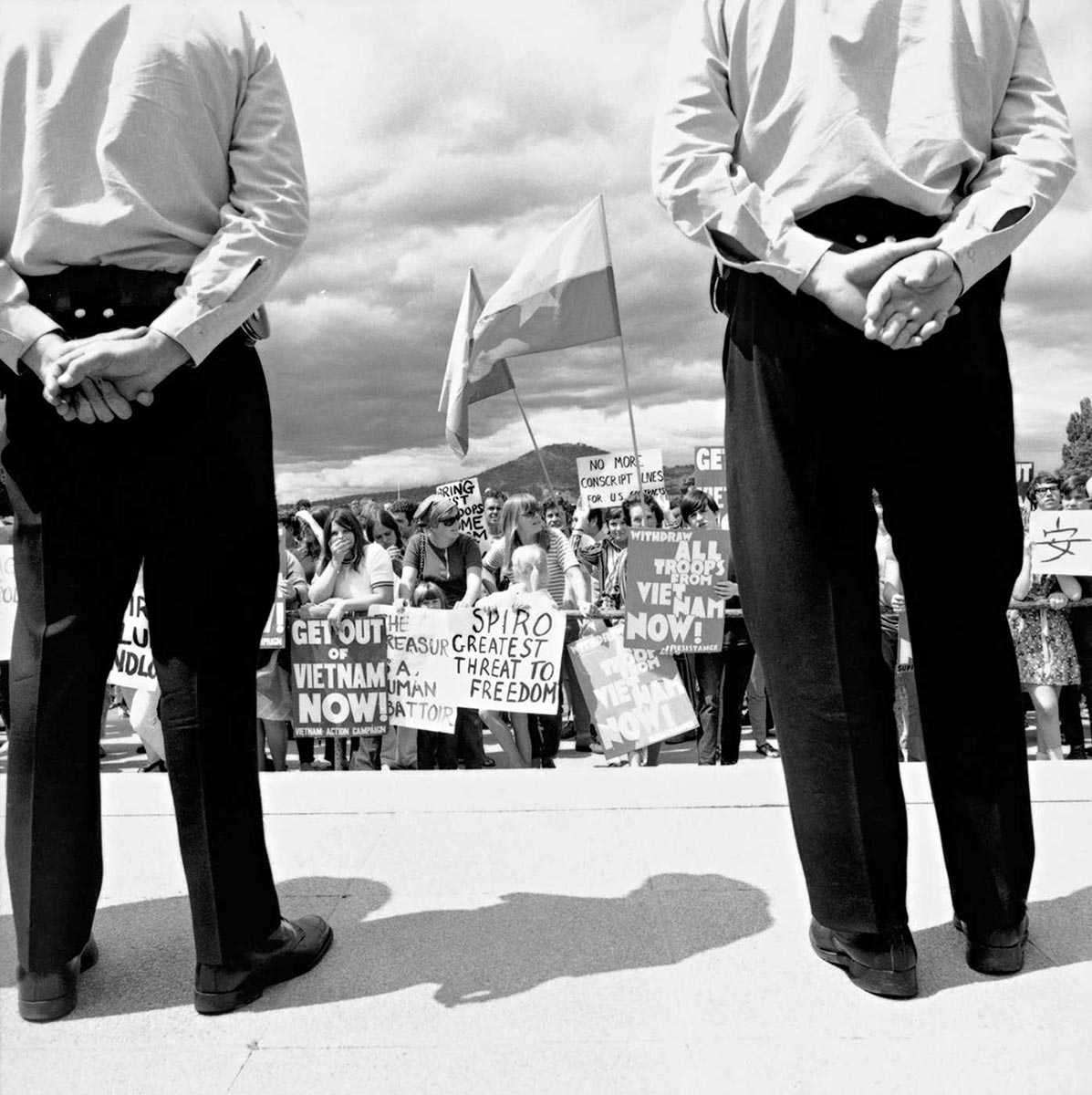 a black and white photo in the 1970s of a protest