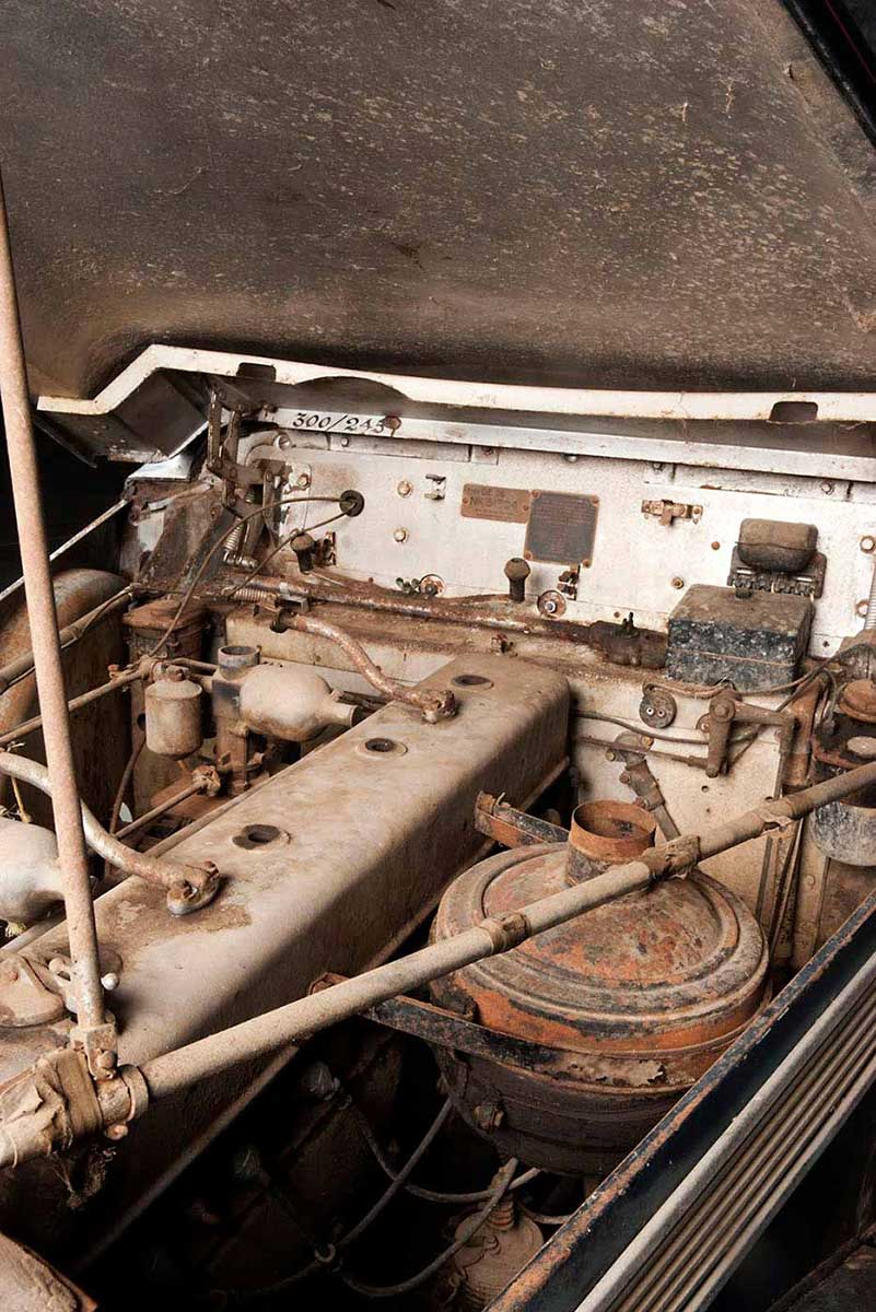 A photograph of the engine of an historic motor vehicle. - click to view larger image