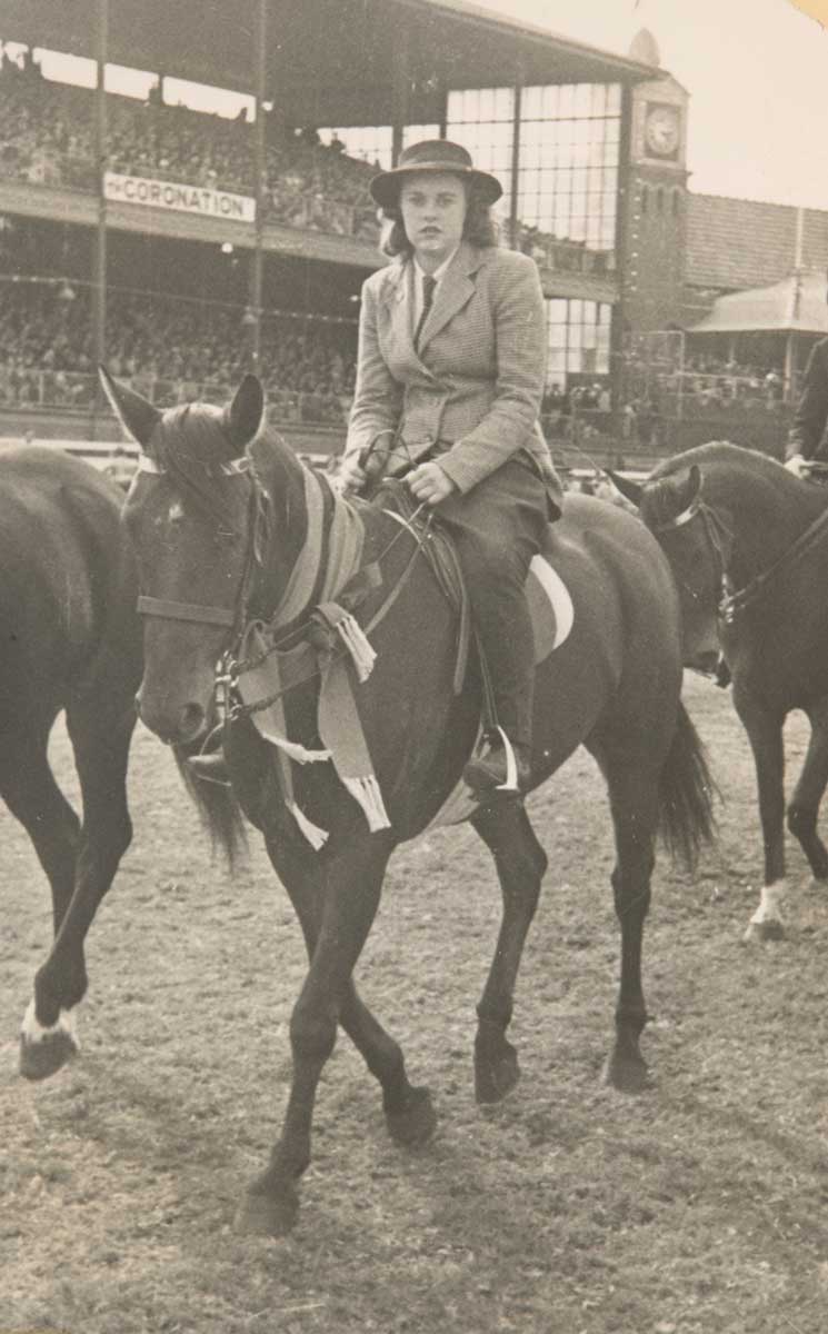 A woman riding a horse - click to view larger image