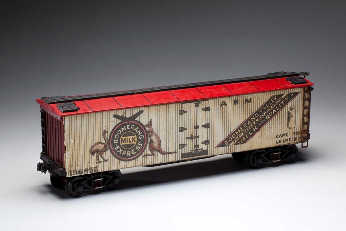 ‘Boomerang Milk Express’ box car, made a wooden chassis, printed cardboard, diecast bogies and printed paper by Frank Slovnic. - click to view larger image