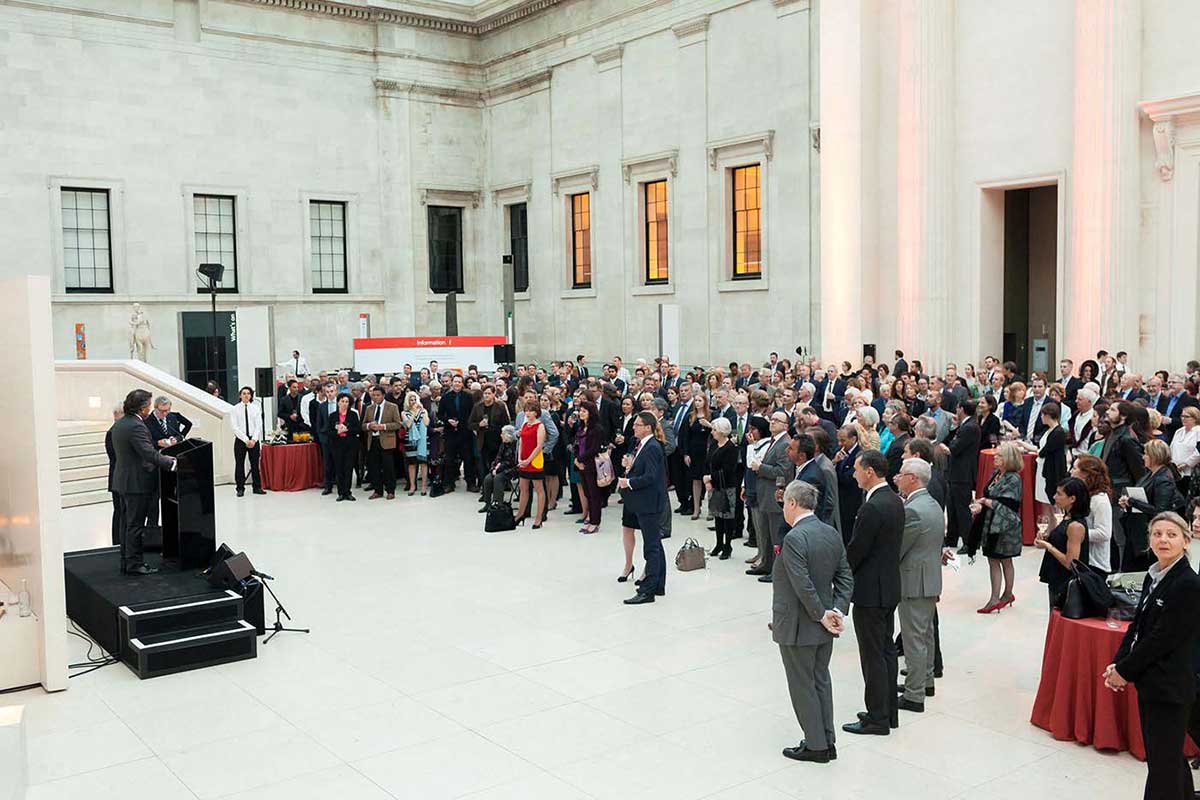 People attending the exhibition launch in an outdoor area of the British Museum. - click to view larger image