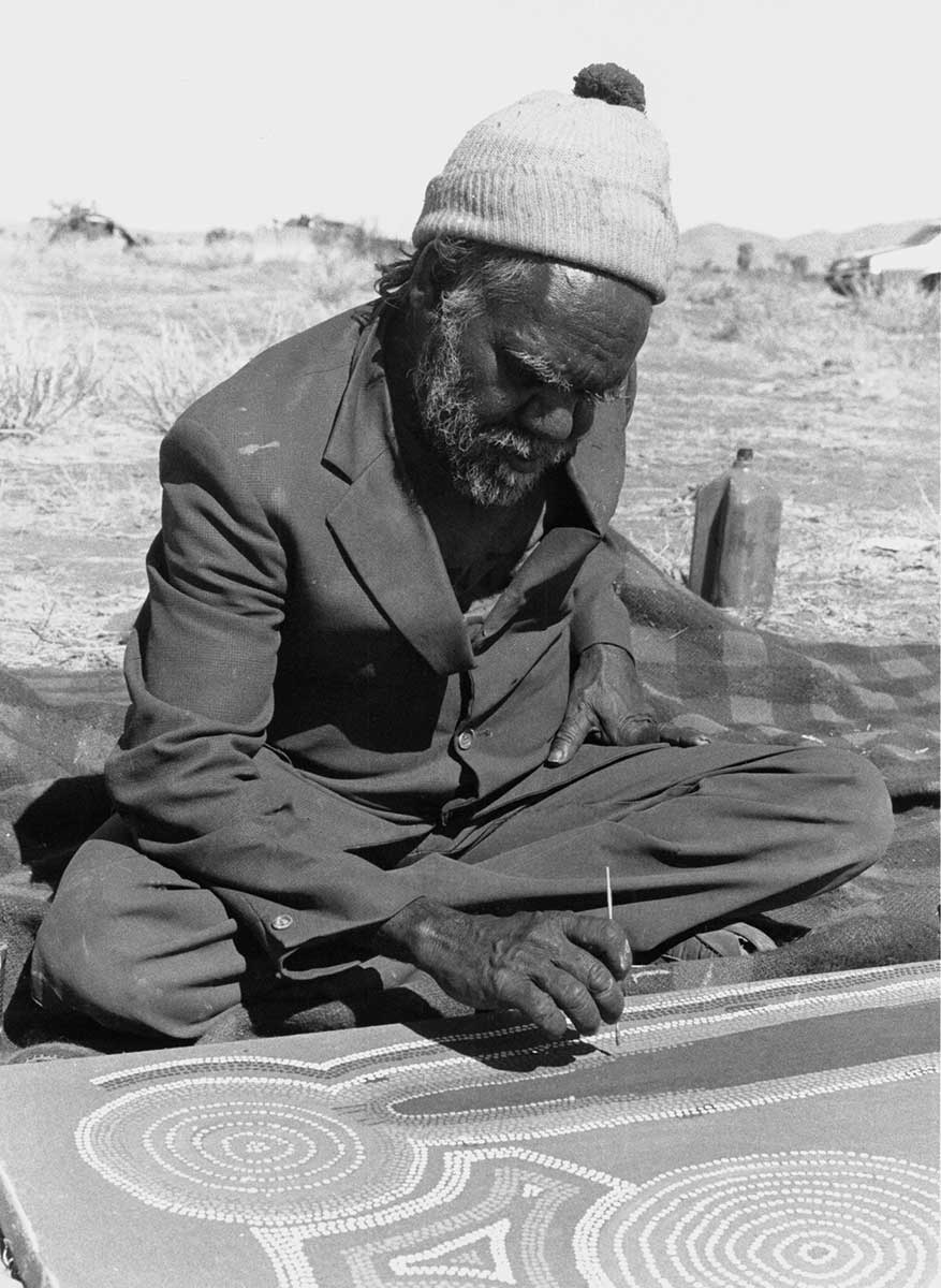 Portrait photo of an Aboriginal Australian man.