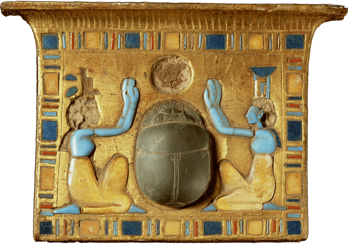 A gold pectoral featuring a scarab beetle.