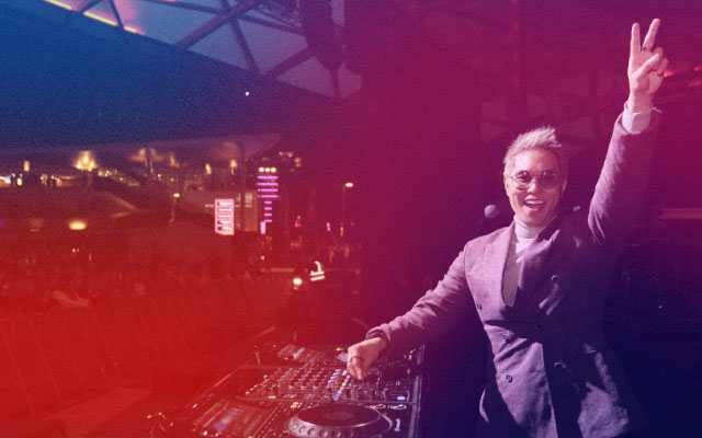 SBS PopAsia host Andy Trieu at the DJ deck.