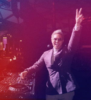 SBS PopAsia host Andy Trieu at the DJ deck