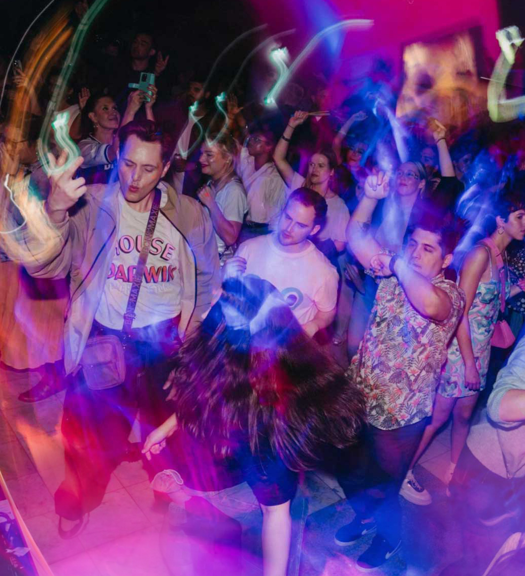 People dancing at a Museum party.