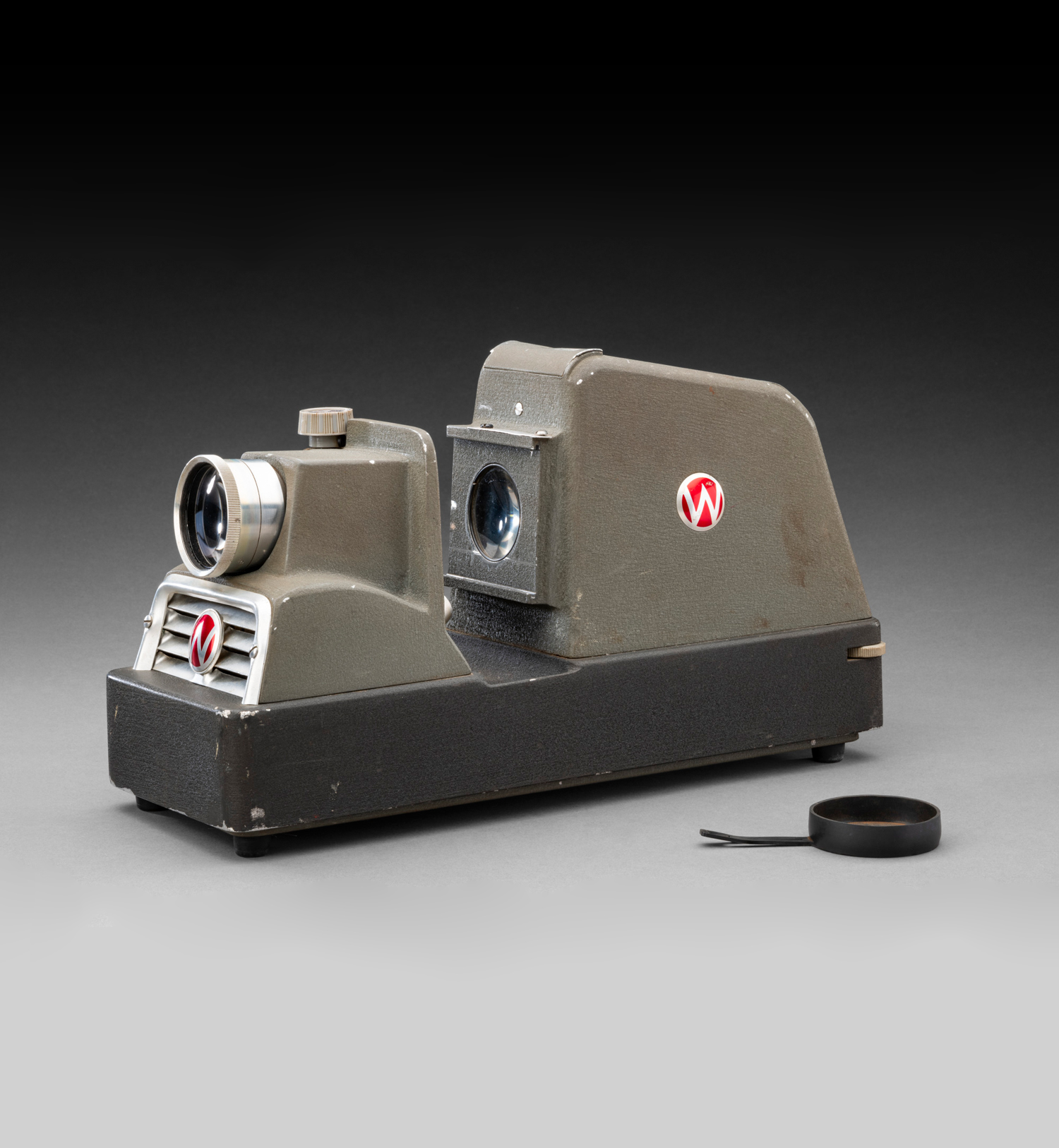 Waterworth slide projector with case and bulbs, used by ANARE expeditioners in Antarctica for entertainment, 1960