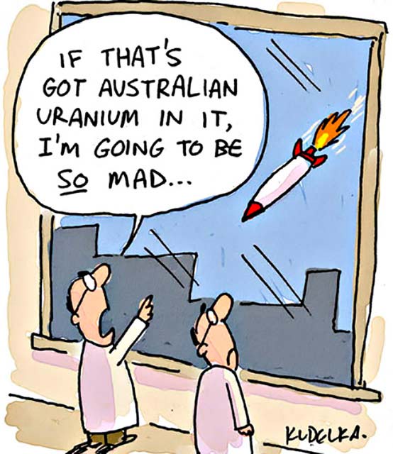 Cartoon of two scientists looking anxiously out the window watching a nuclear weapon heading for the building, hoping it doesn't contain Australian uranium. - click to view larger image