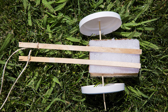 Using paddlepop sticks to make the shaft of a toy cart