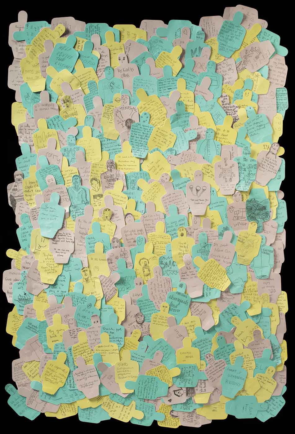 A series of paper figures that have text and drawings on them. - click to view larger image