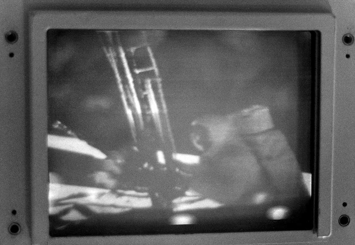 TV monitor with a blurry image of the moon landing. - click to view larger image