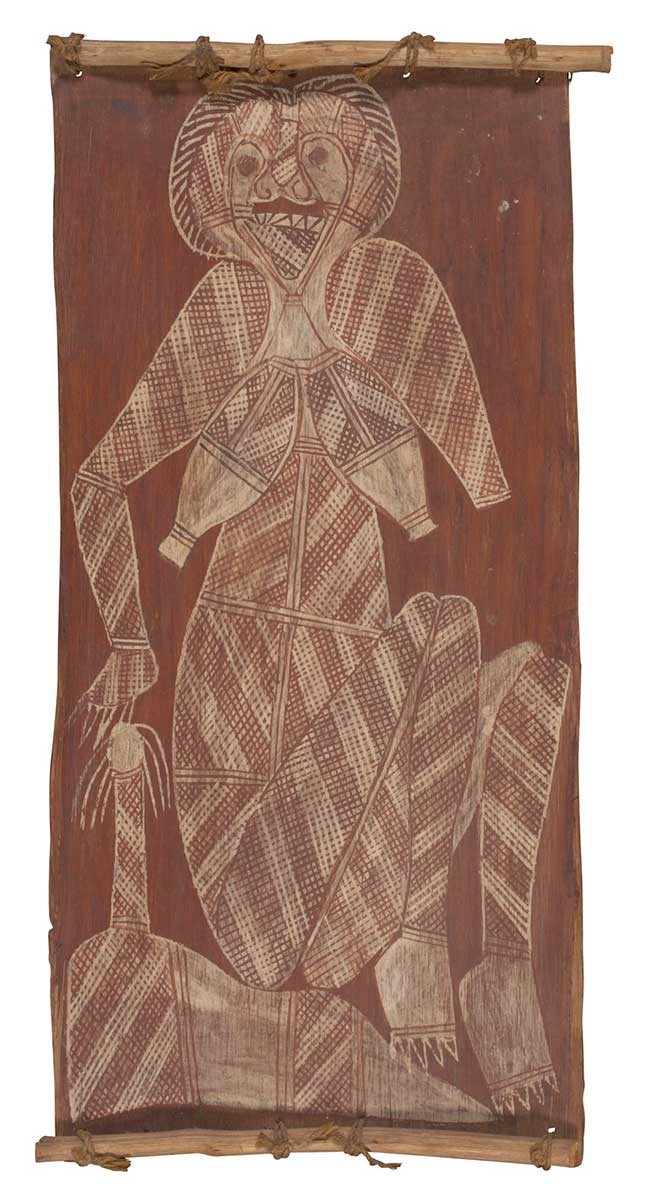 A bark painting worked in ochres on bark and on wooden restrainers. It depicts a female figure seated on a rock. The figure has the lower half of her proper left arm missing. She is painted in crosshatched diagonal lines of brown and white. The painting has a red background. - click to view larger image