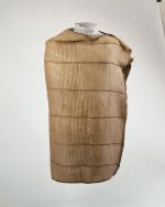 Hand-woven cloak made of flax, with six brown, stripes and brown, patterned edges on the long sides.
