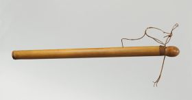 Quiver or arrow case made of a large bamboo cane with plaited coconut fibre wound round its open end. The egg-shaped lid is made of a young light-brown coconut shell.