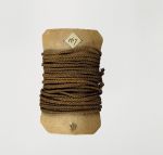 Cord made of coconut fibres and wound round a thin piece of cardboard.