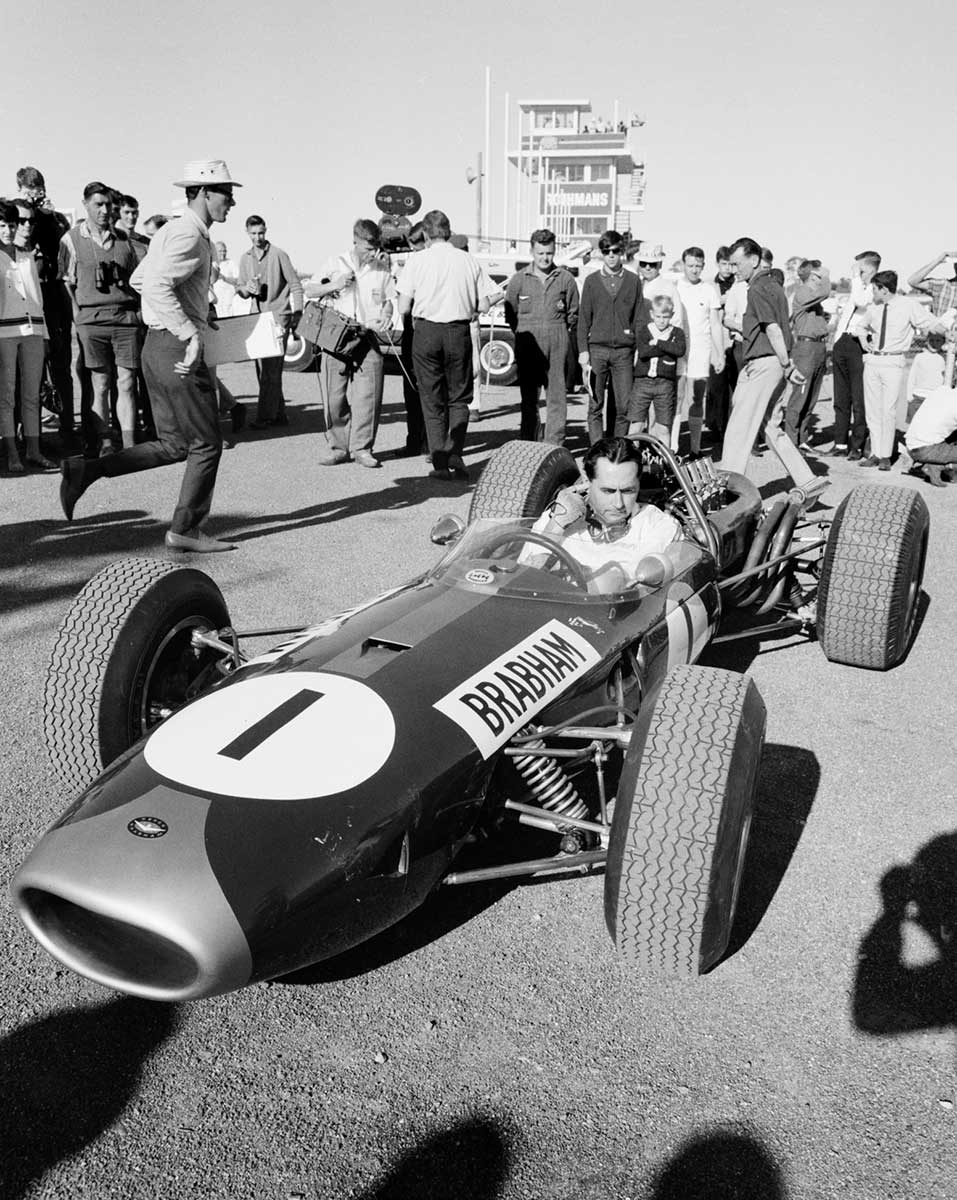 Jack Brabham prepares for an international event in his Repco–Brabham car at Surfers Paradise, Queensland, 1966.  - click to view larger image