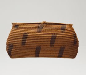 Basket made of sticks from the coconut palm leaf, wrapped up with coconut fibre strings, and connected with the same material.