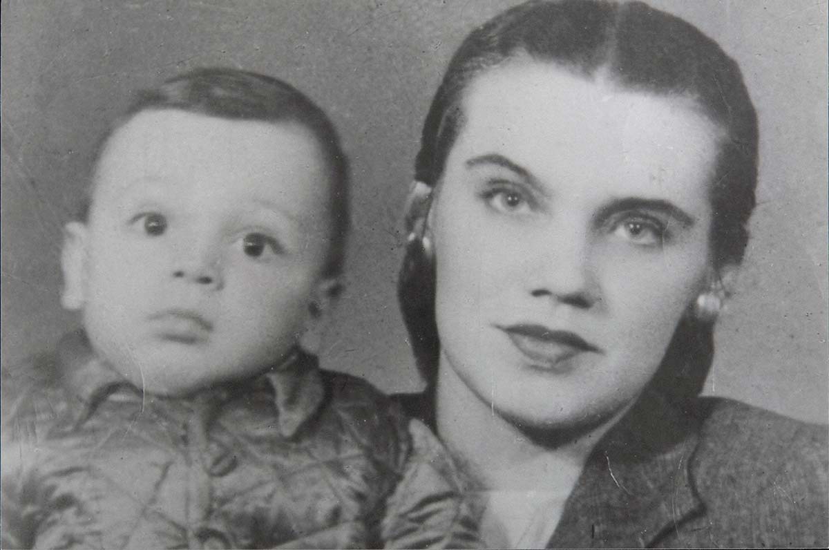 Portrait photo of a young boy, left, and his mother. - click to view larger image