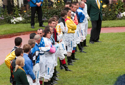 Jockeys competing in the 2010 Melbourne Cup line up in the Mounting Yard