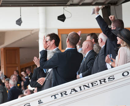 Commiseration and celebration in the Owners Stand, Melbourne Cup Day, 2010